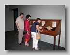 168  Troy Ray, Lynn Cook, + Sylvia Svitak enjoying the antique gesneriad books on display  [SM]
